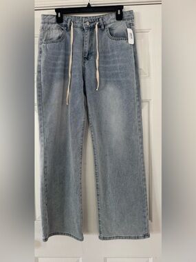 Distressed relaxed denim Women's Jeans in Light Blue Wash with Drawstring Waist